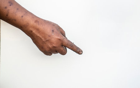 The dirty man's hand showed a gesture of pointing finger.の写真素材