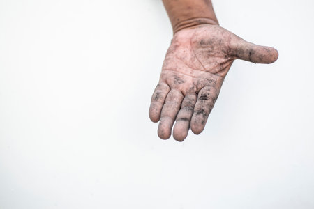This concept shows the meaning of a dirty hand showing an open hand gesture.の写真素材