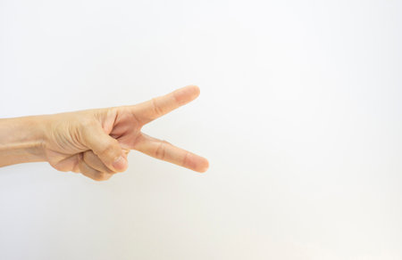 Gestures convey symbolic meanings of the muscles in the hands and fingers of a person.の写真素材