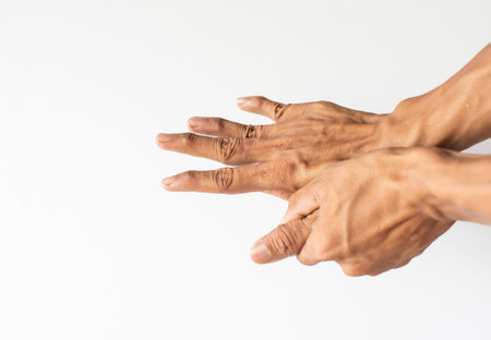 Finger of seniors who have problems trigger fingersの写真素材