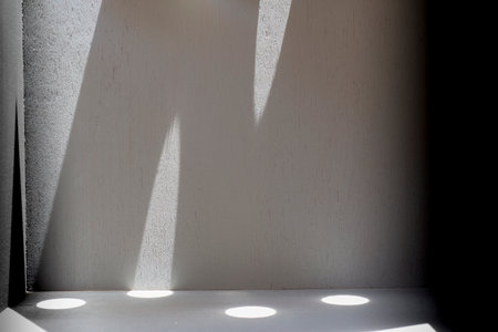 Light and shadow lines on the background in a gray room, empty spaceの写真素材