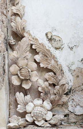 The surface of the flower pattern sculpture, ancient handmadeの写真素材