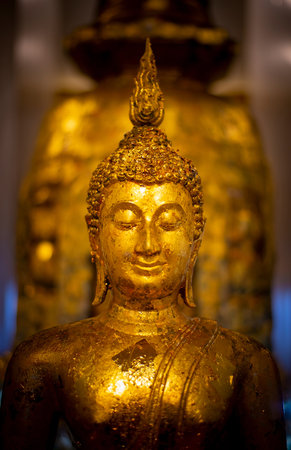 The face of the golden Buddhaの写真素材