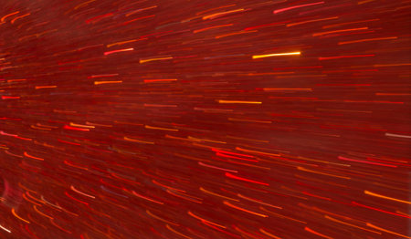 Shimmering light That is sliding at a line on the red surface