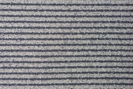 Textured woven fabric, synthetic fiber, pattern printed, gray graphic stripes
