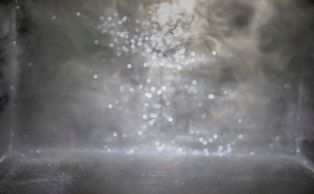 The background in the black room with sparkle and hazeの写真素材