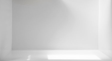 Light and shadow in a white room with empty spaceの写真素材