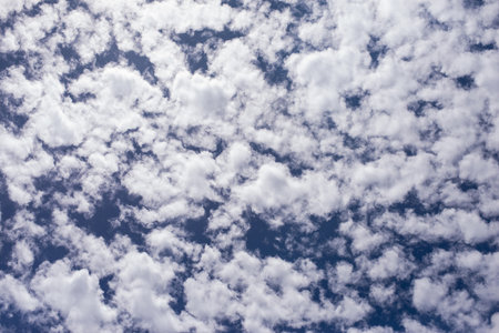 White clouds and blue sky pattern with bright and clear atmosphere. In the outdoor place is natural.の写真素材