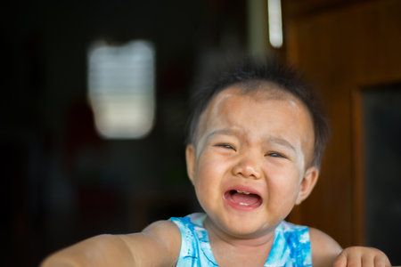Asian baby face is cryingの写真素材