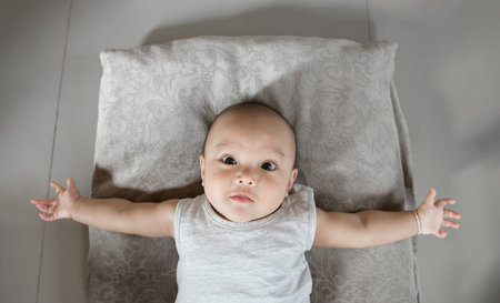 Babies with emotional gestures, smiles, fun playing