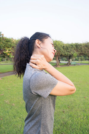 The appearance of a person showing symptoms of muscle aches and painsの写真素材