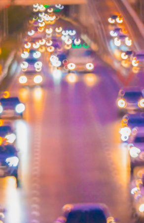 Blurred image of, vehicle on the street at night