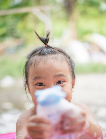 Children who are happy with the activities they play.の写真素材
