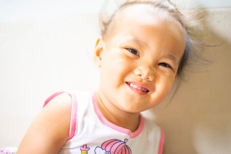 Happy Asian girl face with a smile