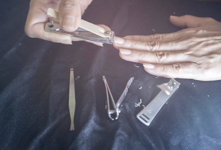Manicures that are trimming fingernailsの写真素材