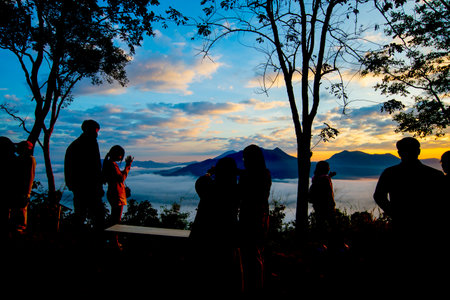 People silhouette form with sunset time in natureの写真素材