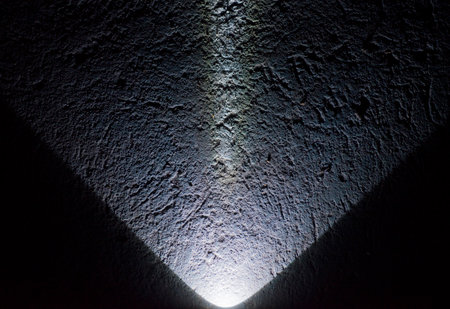 Light shine on the surface of object and shadow on the wall.