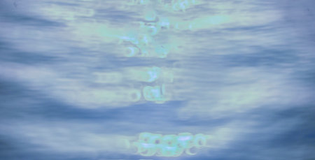 Moving water and natural reflectionsの写真素材