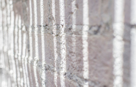 Rough white concrete surface with light and shadow dimensionsの写真素材