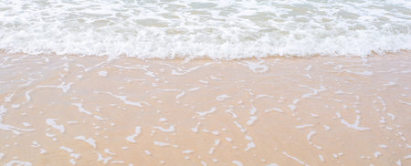 Sea waves on the surface of the coastの写真素材