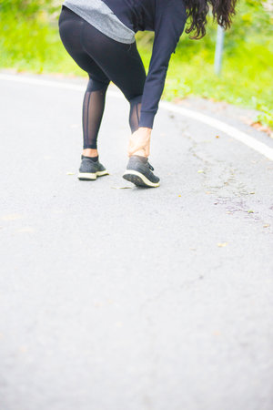 Leg muscle injuries of people exercising, walking, running in outdoor parks.
