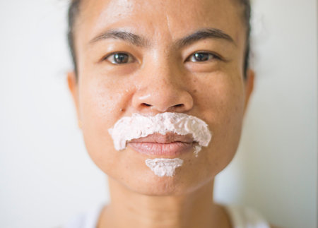 Women's mustache removal. Mustache removal with cream or gel.の写真素材