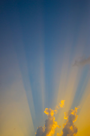 Colorful light from the sun and clouds in the eveningの写真素材