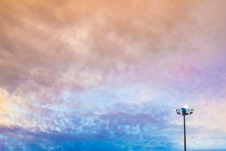 Sky atmosphere during twilight with bright field lightsの写真素材