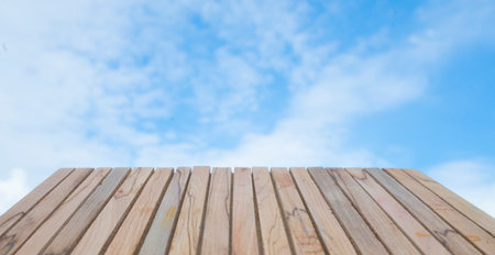 wooden floor and sky with empty foreground areaの写真素材