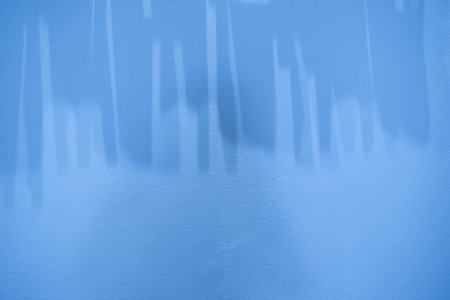 Light and shadow pattern with blue background