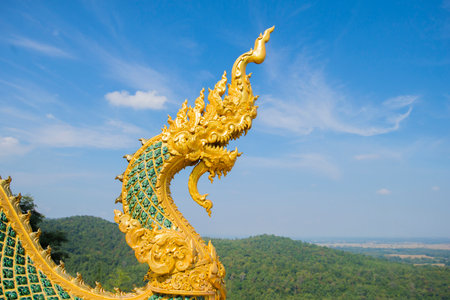 golden dragon statue in thailandの写真素材