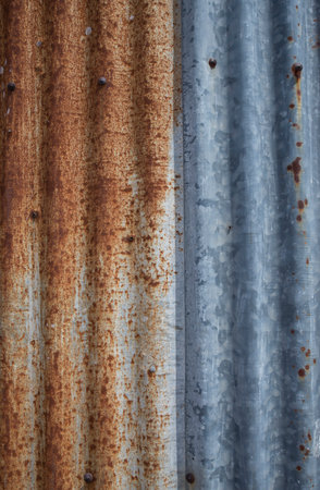 Rusty corrugated iron sheet texture background.