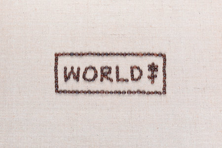 World sign made from coffee beans near a flower icon enclosed in rectangle isolated on creamy linea canvas, shot top view, aligned in center.の写真素材