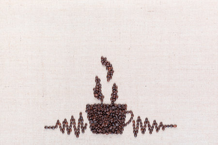 Just prepared hot coffee crafted using coffee beans, aligned in the center at the bottom.の写真素材