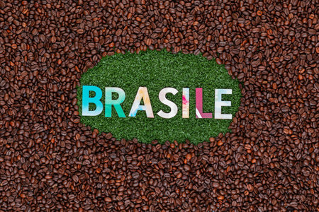 Word Brasile with colorful letters on artificial grass surrounded by roasted coffee beansの写真素材
