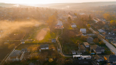 A beautiful village at sunrise, shot from above.