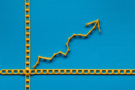 An orange graph on ocean blue background, shot from above.の写真素材