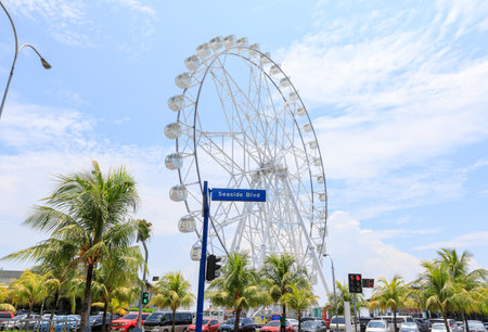 May 31, 2017 Ferris wheel at Mall of Asia in Manila. The ferris wheel is situated near Manila Bayのeditorial素材