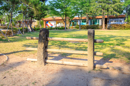 Jeju Island Traditional Gate - crossbars and guard posts in National folk museum on Jun 19, 2017 in Seoul, Korea - Jeju symbolのeditorial素材