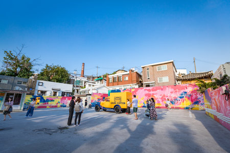 Untitled tourists visit the parking lot that displays the historic yellow car of Louis Vuitton on Jun 19, 2017 in Samcheong-Dong, Seoul city, Korea - Tour destinationのeditorial素材