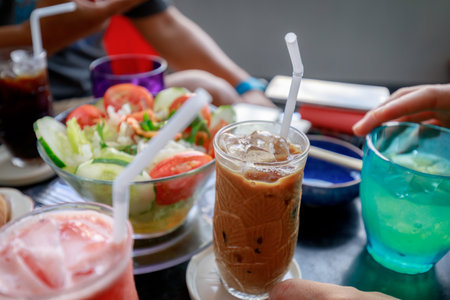 Vietnamese ice coffee with foodの写真素材