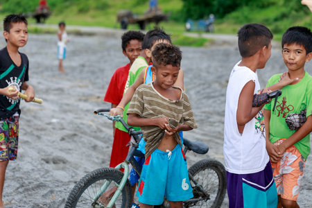 Local Filipino children living near volcano Mount Pinatubo on Aug 27, 2017 in Santa Juliana, Capas, Central Luzon, Philippines. the people suffer of poverty due to the bad economy, political issue.のeditorial素材