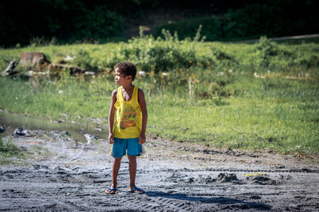 Portrait of Aeta tribe little boy near Mount Pinatubo on Aug 27, 2017 in Santa Juliana, Capas, Central Luzon, Philippines. the people suffer of poverty due to the bad economy, political issue.のeditorial素材