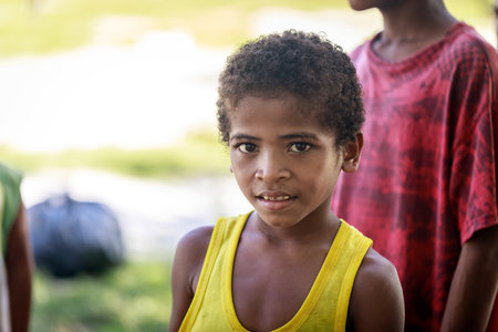 Portrait of Aeta tribe little boy near Mount Pinatubo on Aug 27, 2017 in Santa Juliana, Capas, Central Luzon, Philippines. the people suffer of poverty due to the bad economy, political issue.のeditorial素材