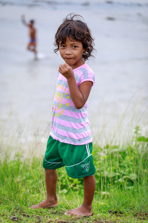 Portrait of Aeta tribe little girl near Mount Pinatubo on Aug 27, 2017 in Santa Juliana, Capas, Central Luzon, Philippines. the people suffer of poverty due to the bad economy, political issue.のeditorial素材