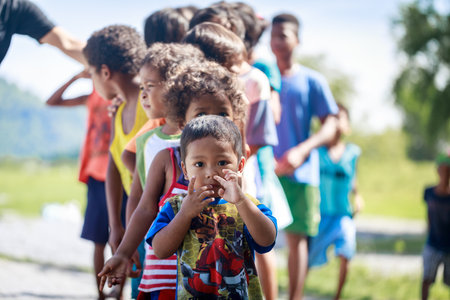 The Aeta tribe children near Mount Pinatubo on Aug 27, 2017 in Santa Juliana, Capas, Central Luzon, Philippines. the people suffer of poverty due to the bad economy, political issue.のeditorial素材
