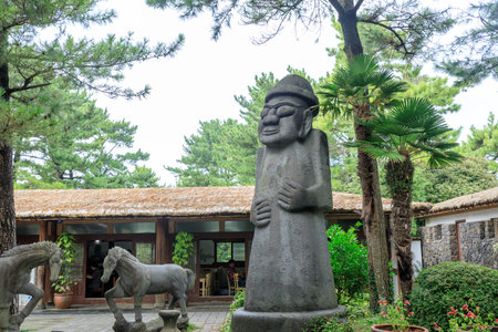 Stone grandpa sculpture at Harlem Park, which is one of the most popular tourist spots on Oct 5, 2017 on Jeju Island, South Koreaのeditorial素材