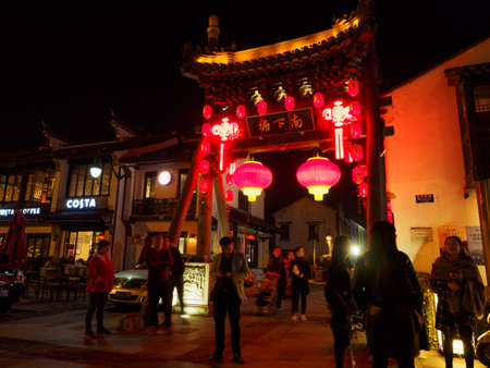 Night scene of Nanchang restaurant street with historic building and chinese lanterns on Nov 11, 2017 located in Wuxi Shi, Jiangsu Sheng, Chinaのeditorial素材