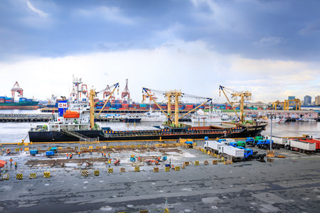 Manila port with containers, business logistic and ships on Nov 21, 2017 in Metro manila, Philippinesのeditorial素材