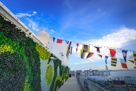 Main Pool deck facility with beach seats of Dream Cruises sailing away from Hong Kong on Nov 21, 2017 at port of Manila, Philippinesのeditorial素材